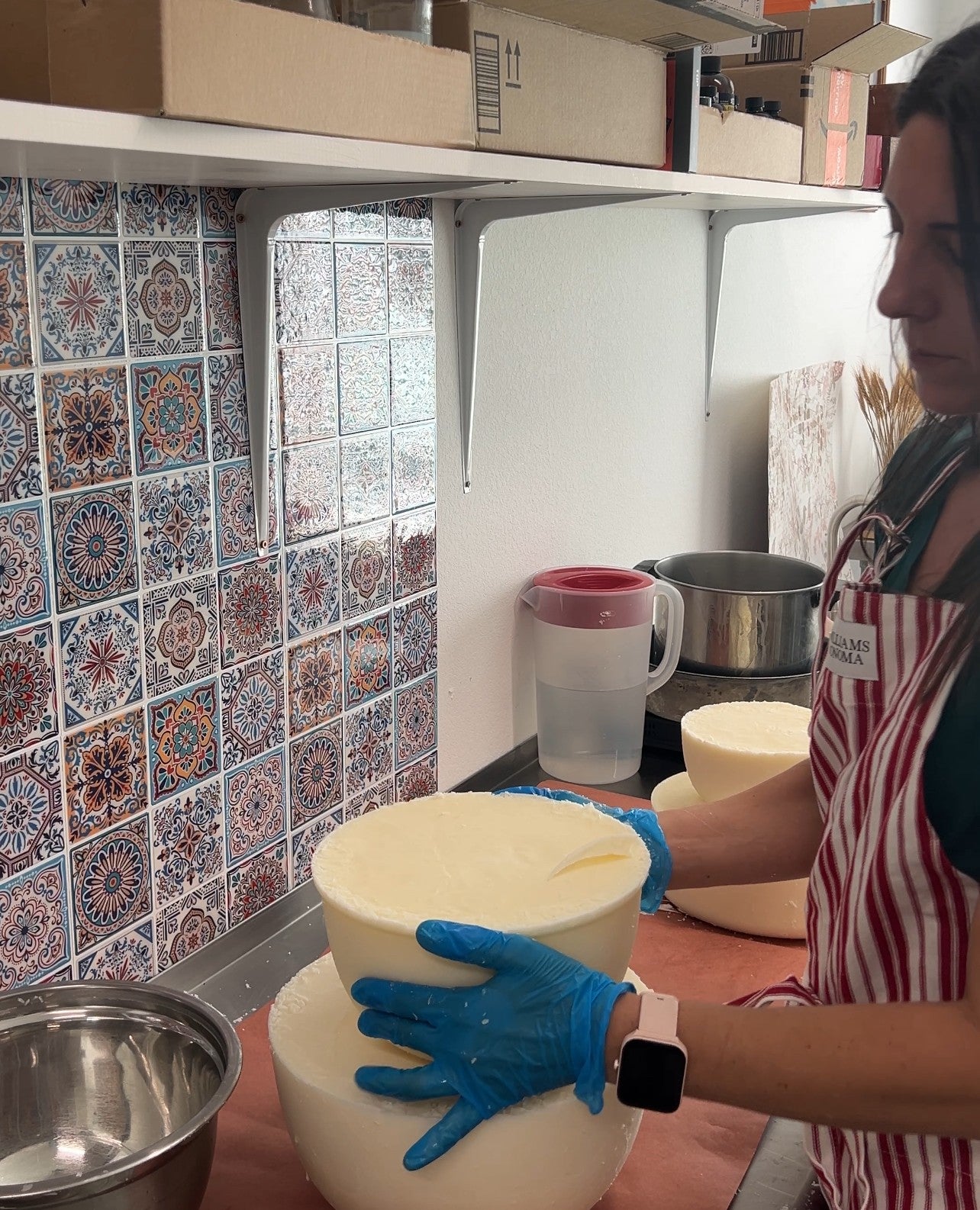Woman Holding tallow blocks